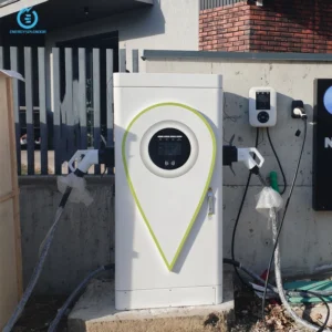 White DC charging cabinet installed in an outdoor setting, connected to two charging guns, with wall-mounted AC controller beside it.